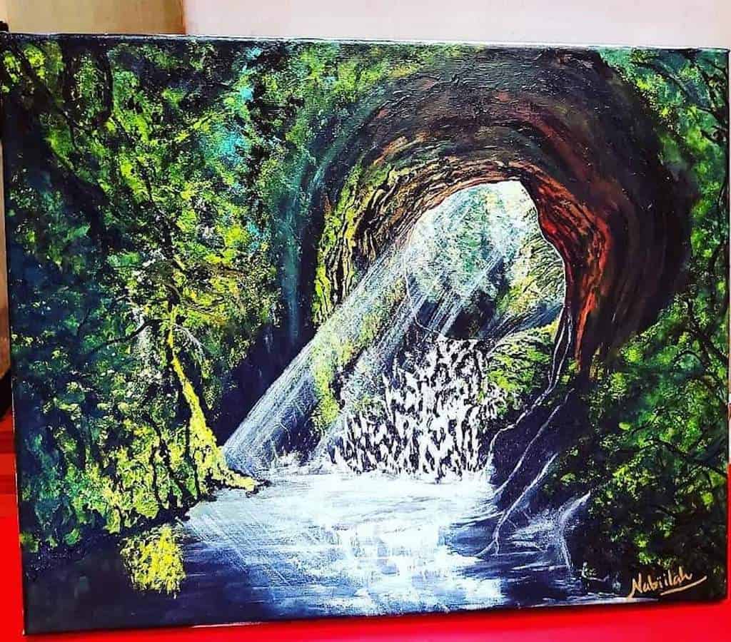 Hidden Cave with Waterfall
